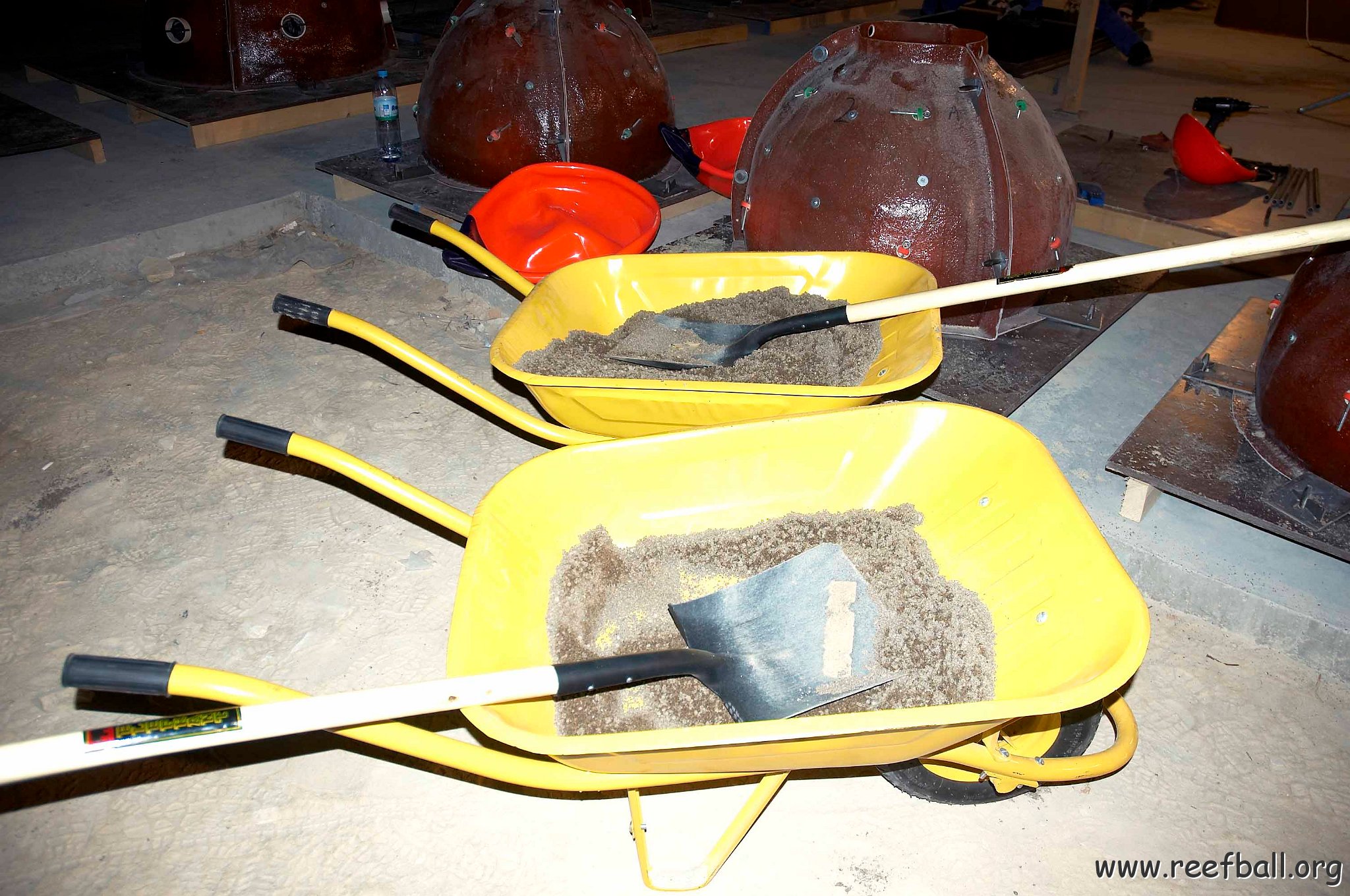 Wheelbarrow with Sand and Shovel