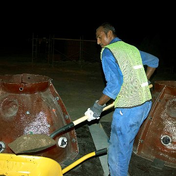 Filling the Molds with Sand